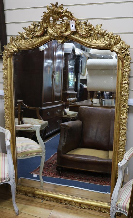 A late 19th century French giltwood and gesso wall mirror W.100cm